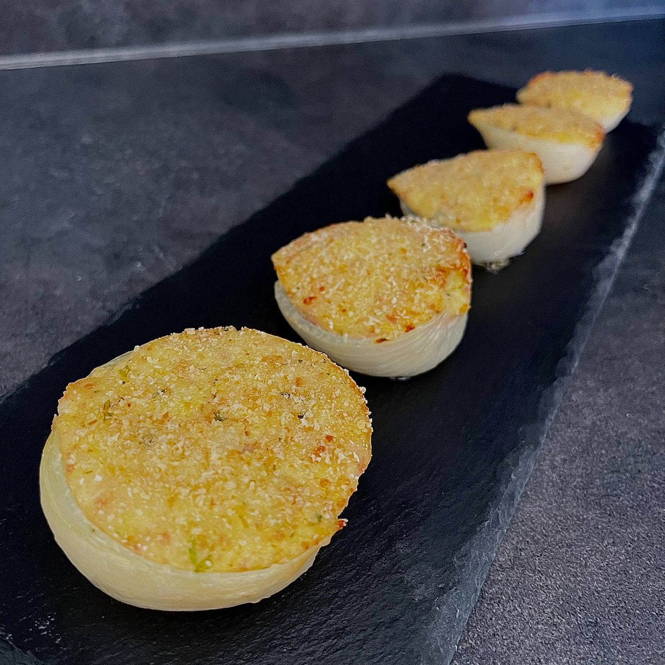 Cipolle ripiene di patate e mortadella
