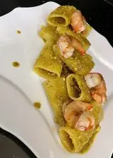 Ricetta Paccheri al pistacchio e gamberi lardellati