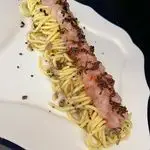 Ricetta Tagliolini al tartufo nero con crudo di scampi e gamberi rossi