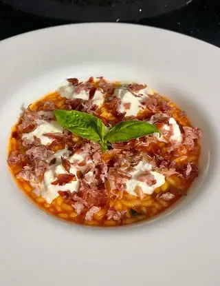 Ricetta Risotto al pomodoro con speck e stracciatella di unaforchettadigitale