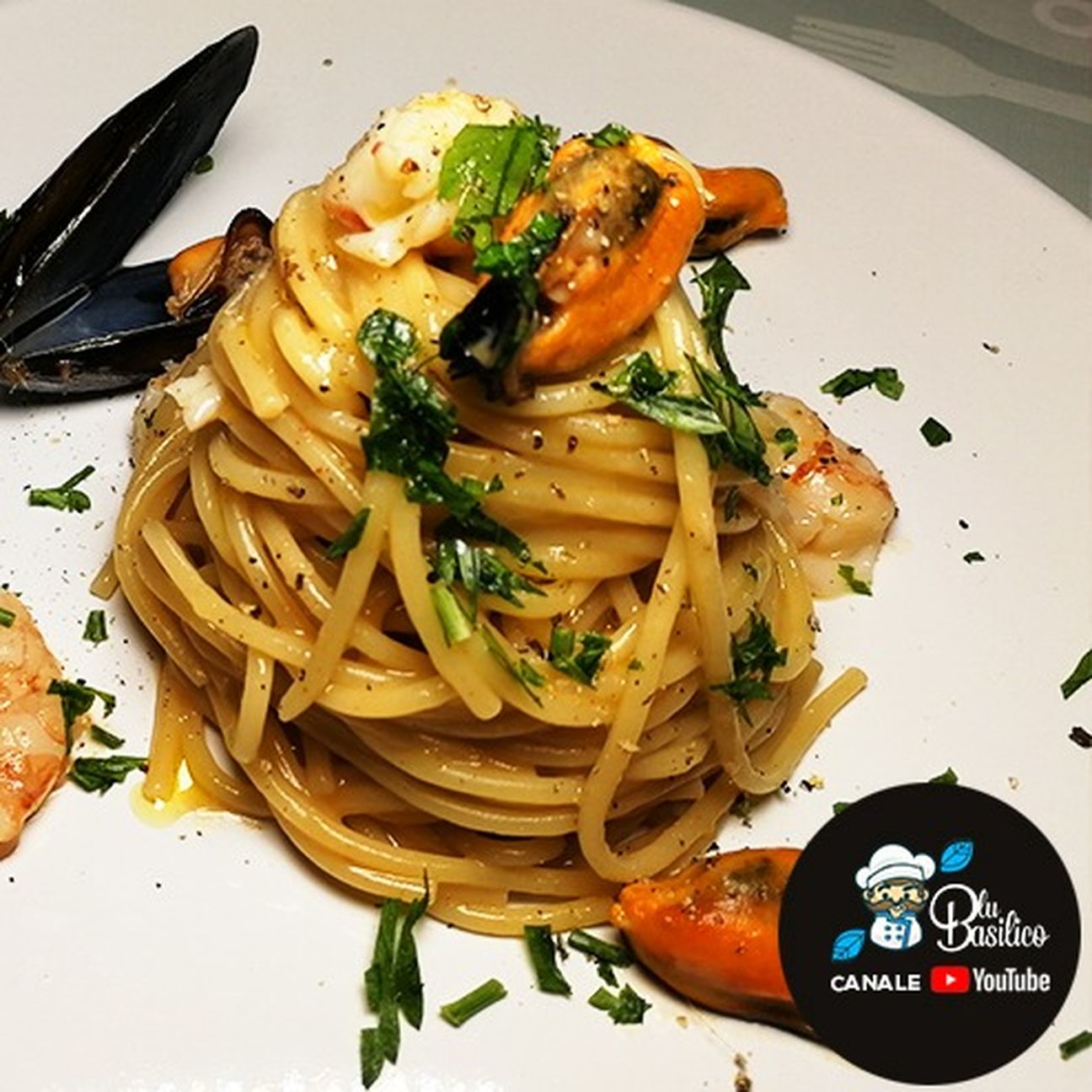 Spaghetti risottati con gamberoni e cozze