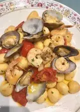 Ricetta Gnocchetti con gamberi e vongole