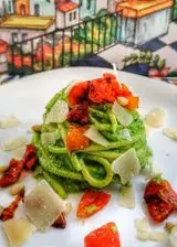 Ricetta Pesto al prezzemolo, pomodori confit e scaglie di grana