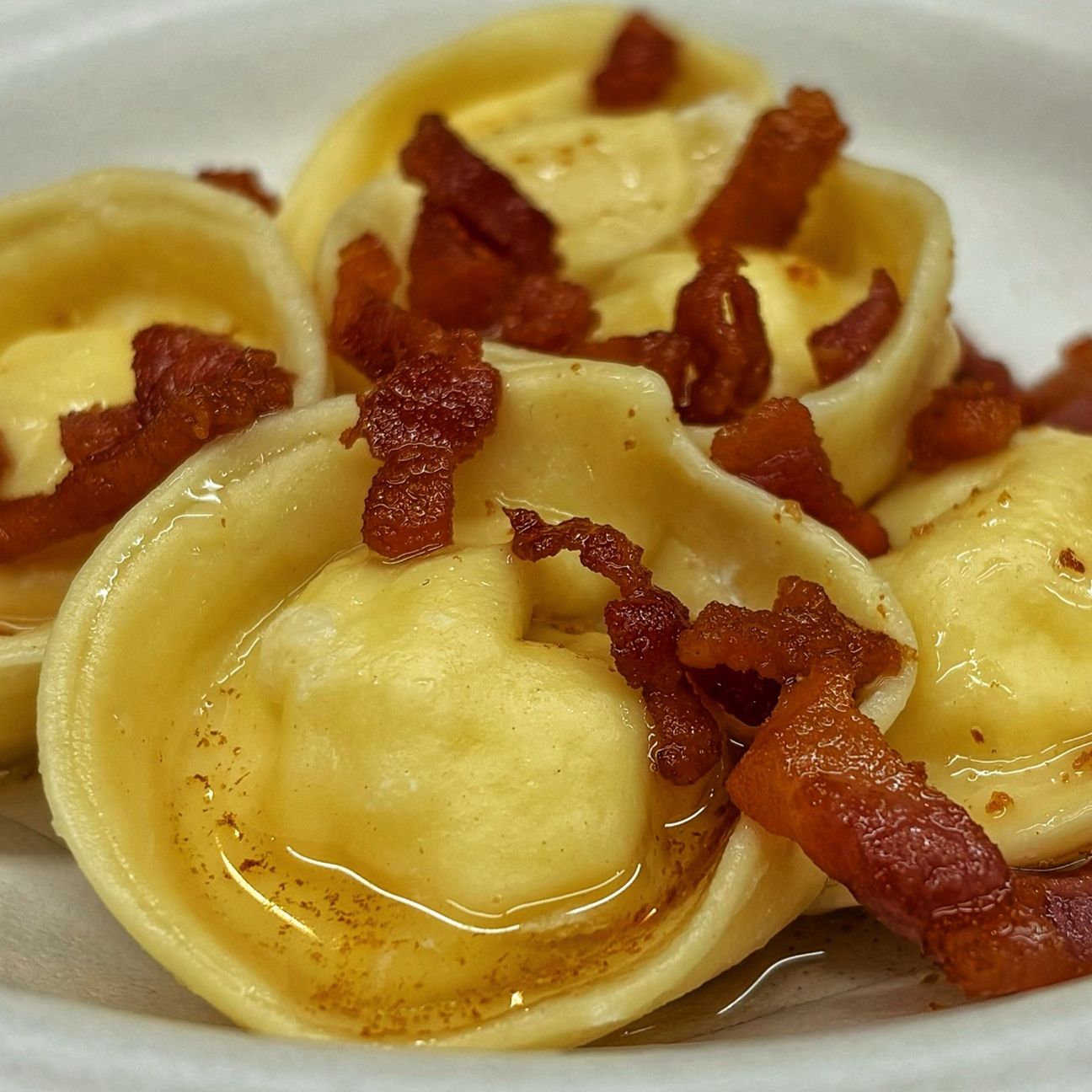 Tortelli ripieni di formaggio di fossa e guanciale
