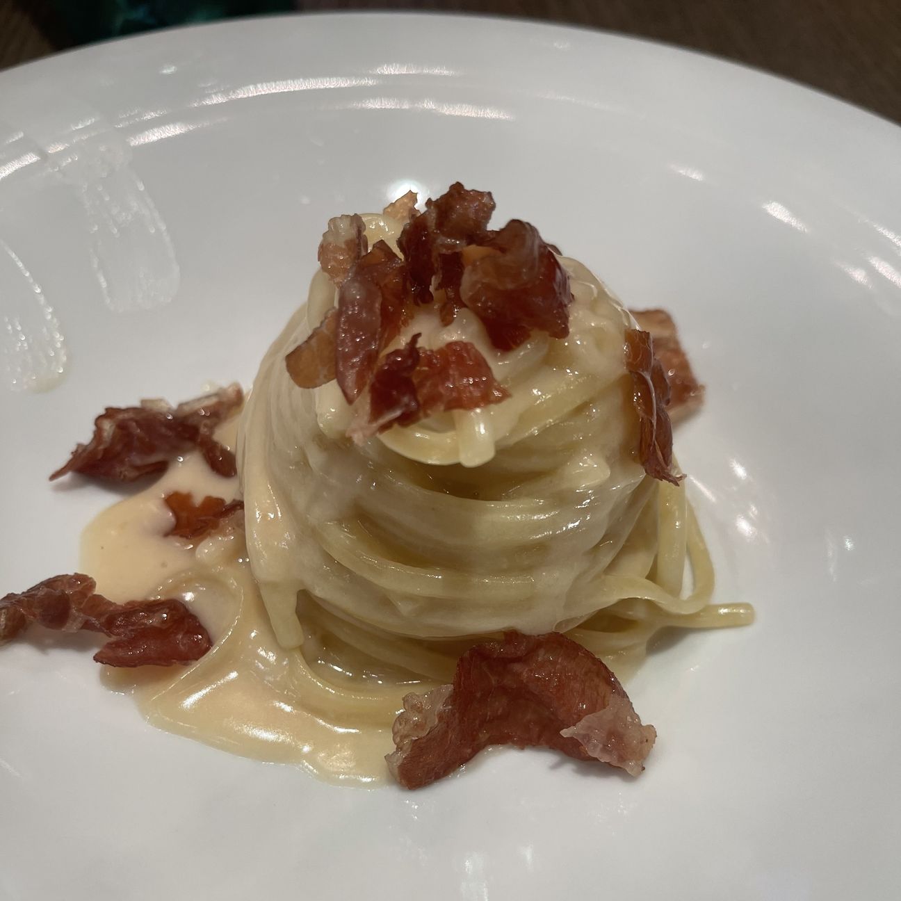 Spaghetti con parmigiano e prosciutto crudo