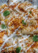 Ricetta Paccheri con cavolfiore, crema di pecorino e mollica alla nduja