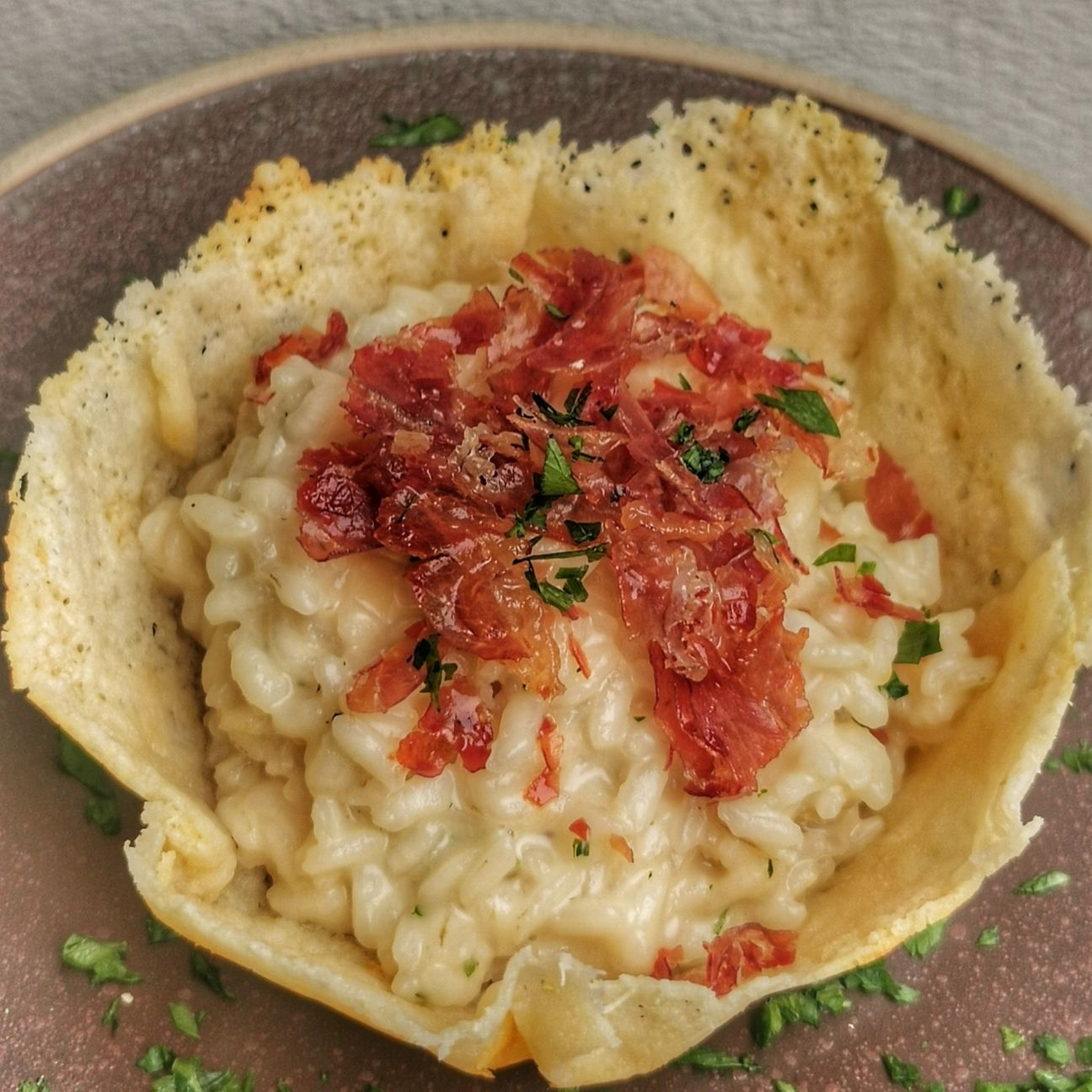 CESTINO DI PARMIGIANO CON RISOTTO AL TALEGGIO E CULATTA CROCCANTE
