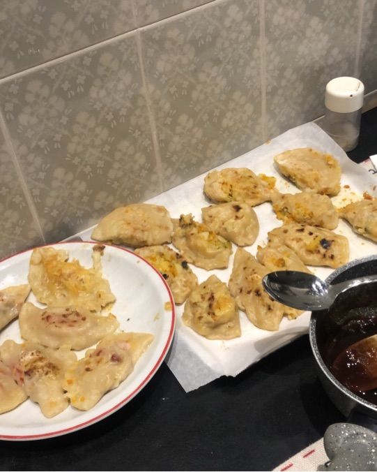 Ravioli al vapore in padella