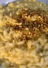 Ricetta Risotto con crema di zucca, stracchino e noci tostate