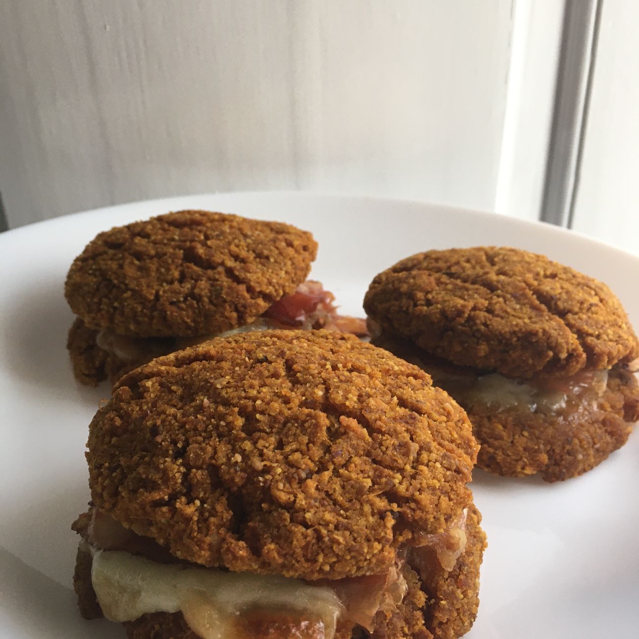 Burger di zucca con speck e scamorza affumicata