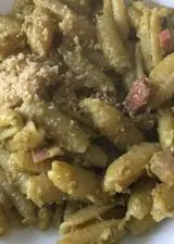Ricetta Gnocchetti sardi con crema di piselli, speck e noci
