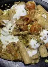 Ricetta Tortiglioni con pesto di pistacchi, pomodorini e stracciatella