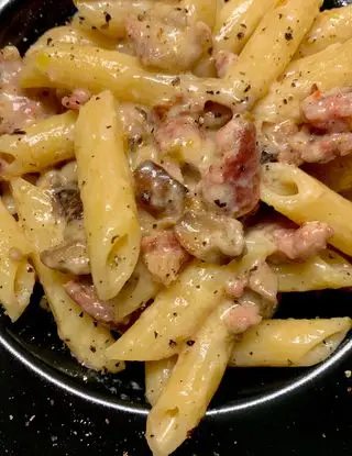 Ricetta Penne con fonduta di taleggio, salsiccia e funghi porcini di tagfooditalia