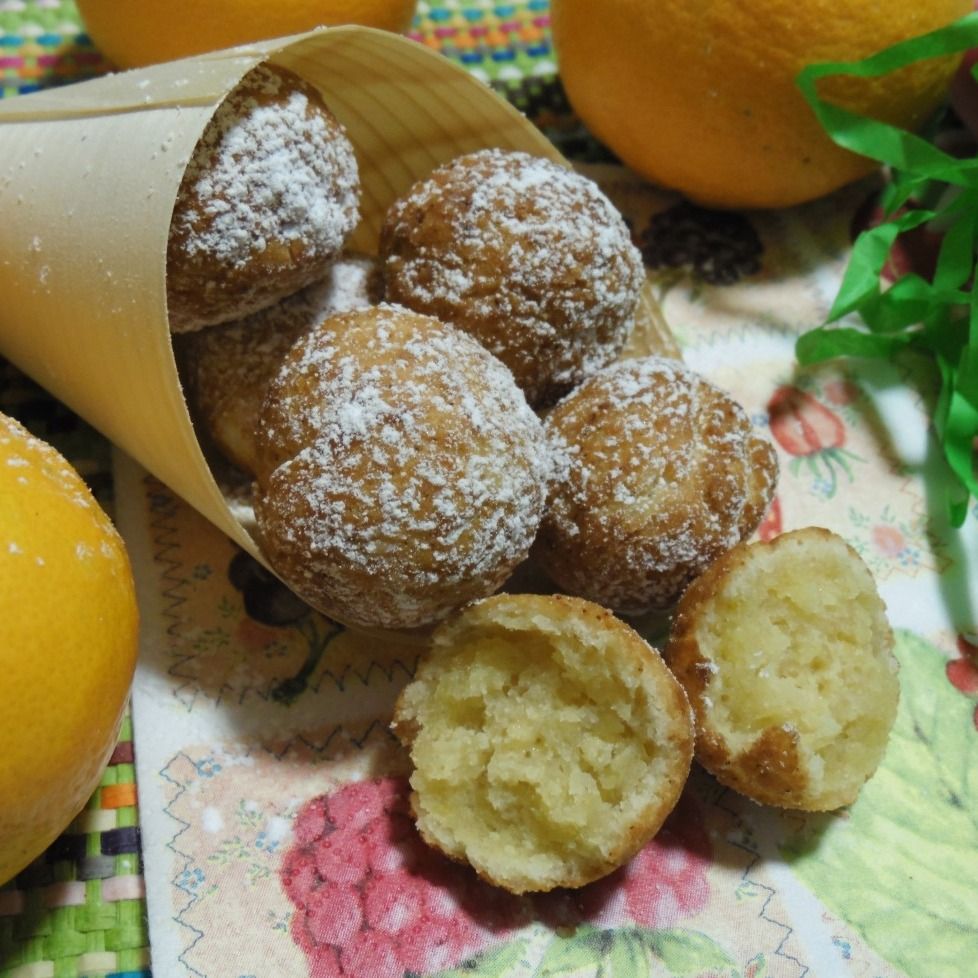 Castagnole soffici senza uova al succo di arancia