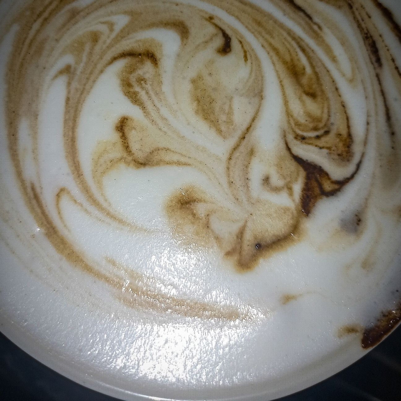 Freshly brewed Illy Latte Machiatto