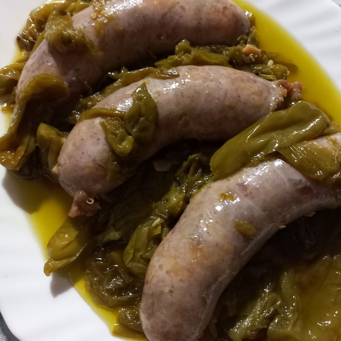 Salsicce con peperoncini dolci ( friggitelli )