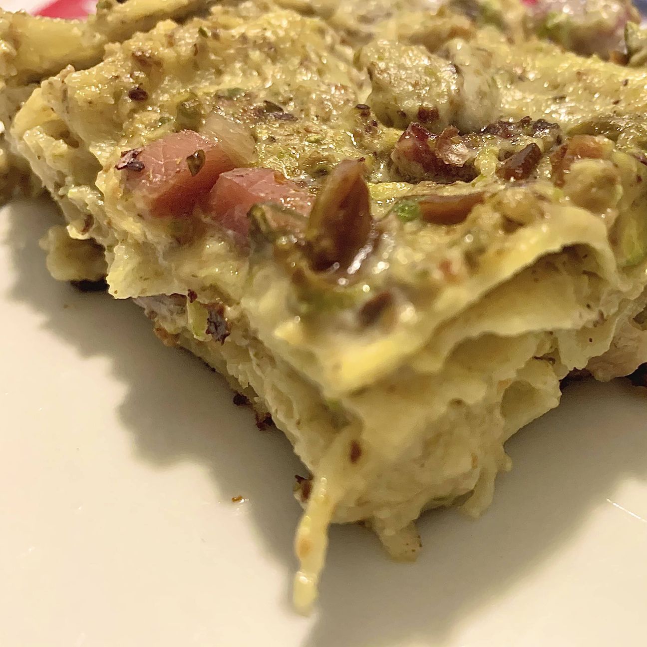 Lasagna al pistacchio con speck e provola