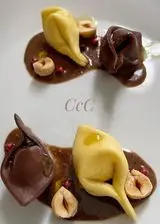 Ricetta Tortelli aglio nero e nocciole