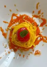 Ricetta Tagliolini con crema di pomodorini caramellati e granella di pistacchi
