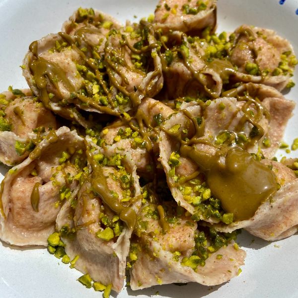 Tortelli mortadella, pistacchio e stracciatella 😍 Al.ta Cucina