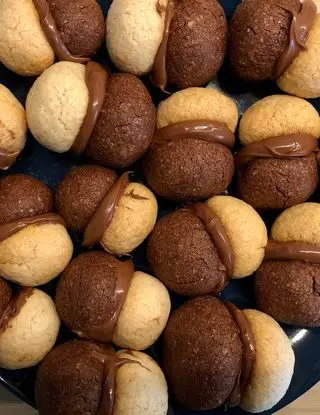 Ricetta Bacioni di dama bicolori con avena  e cioccolato 🍫 ripieni di Nutella 🧉 di valentina63