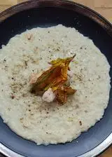 Ricetta Risotto al gorgonzola con gamberi,fiori di zucca secchi e Granella di nocciole