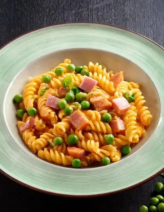 Ricetta Fusilli con crema di zucca, piselli e prosciutto cotto di michele_lamonaca