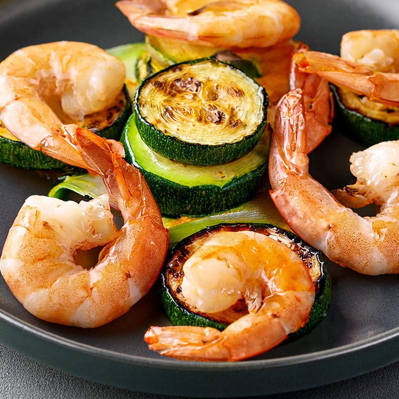 Gamberoni al brandy con zucchine