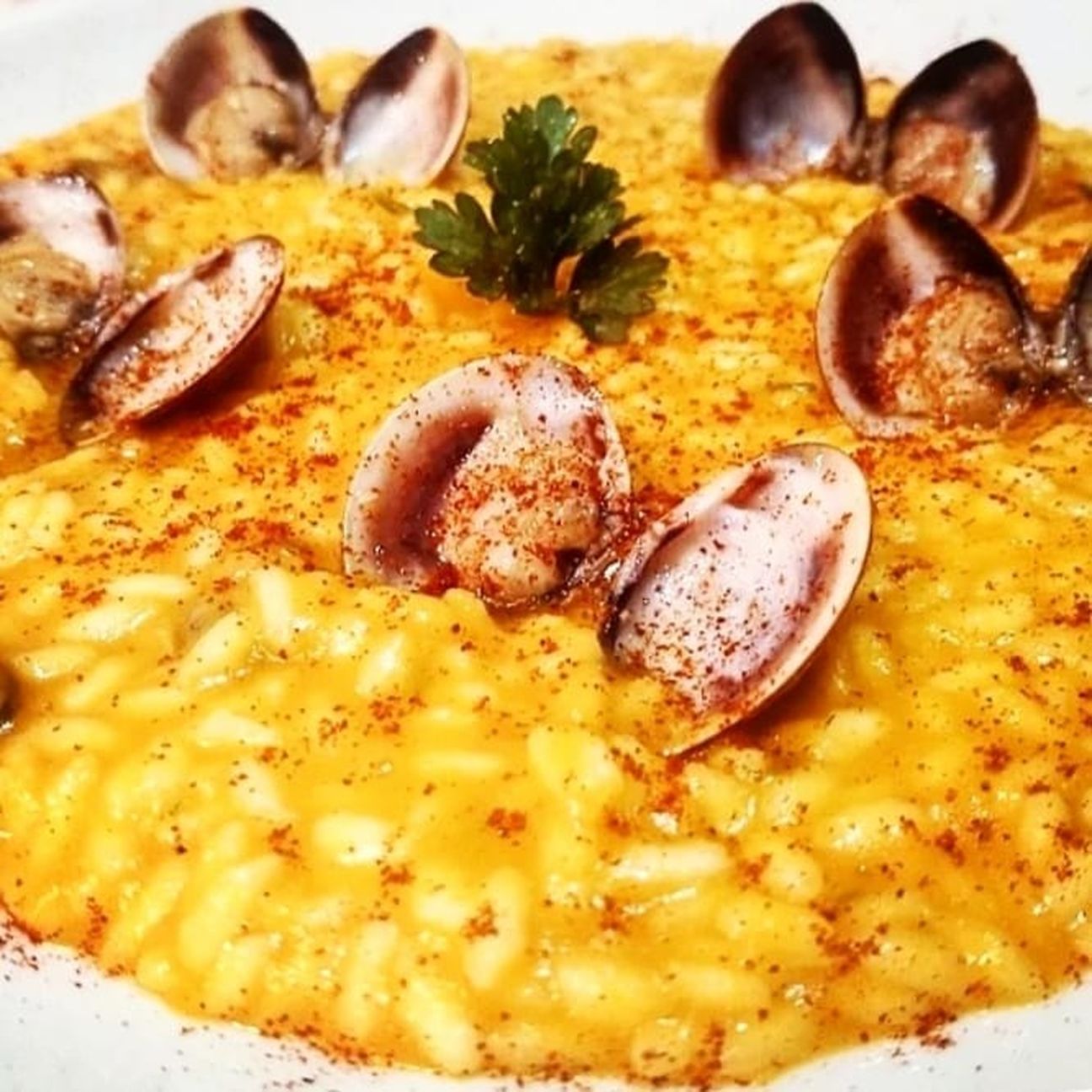 Risotto con zucca, vongole e peperoncino