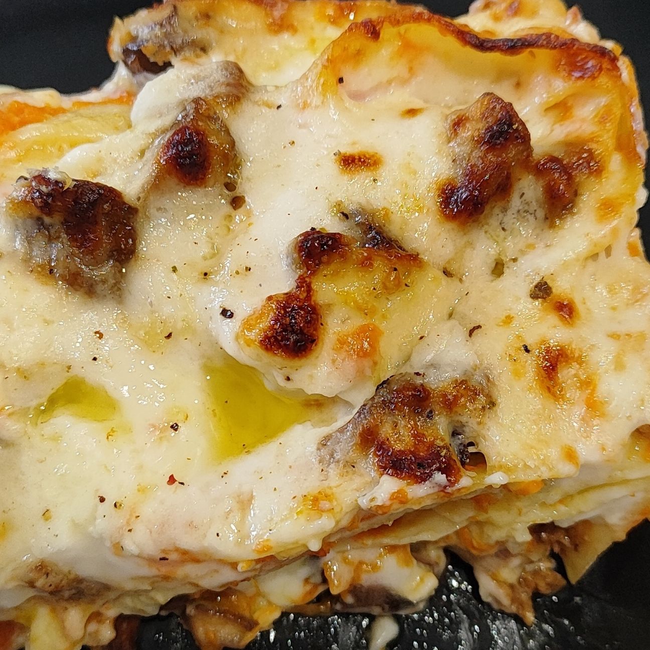 Pappardelle al forno con zucca,formaggio alle noci,porcini e besciamella