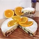 Ricetta Torta di ricotta, arancia e nocciole