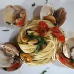 Ricetta Spaghetti con tartufi di mare.