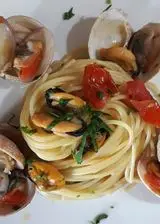 Ricetta Spaghetti con tartufi di mare.