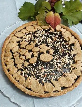 Ricetta Crostata con frolla alle nocciole e crema al cioccolato fondente. di simoneantonella54