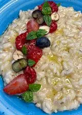 Ricetta Risotto al parmigiano con nocciole e frutti rossi