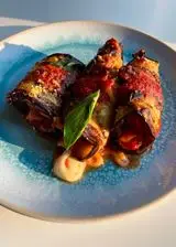 Ricetta Involtini di melanzane con prosciutto cotto e scamorza