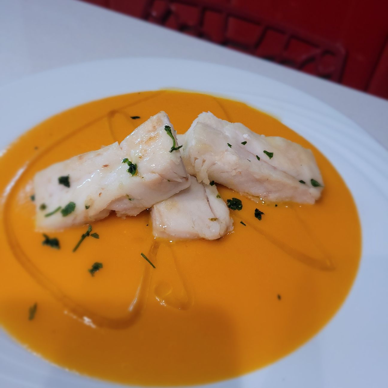 Nasello con vellutata di zucca e patate