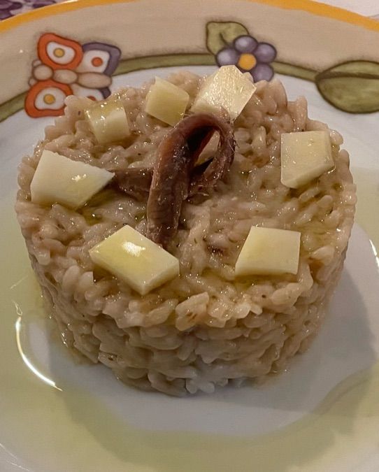 Riso , burro e alici con caciocavallo