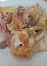 Ricetta Mafaldelle al forno con besciamella,funghi e prosciutto cotto