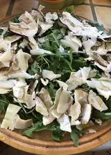 Ricetta Carpaccio di Porcini e Grana su letto di rucola