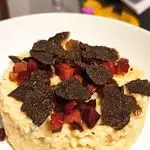 Ricetta Risotto gorgonzola,speck e tartufo nero