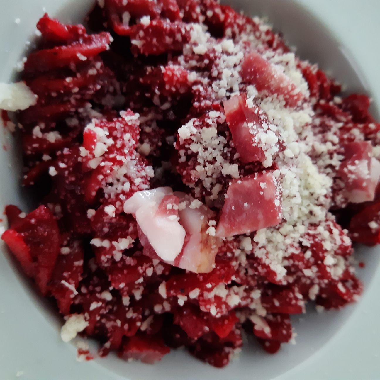 Fusilloni con crema di rape, 'nduja, salame e spolverata di pecorino romano