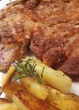 Ricetta Cotoletta alla milanese con patate a forno al rosmarino