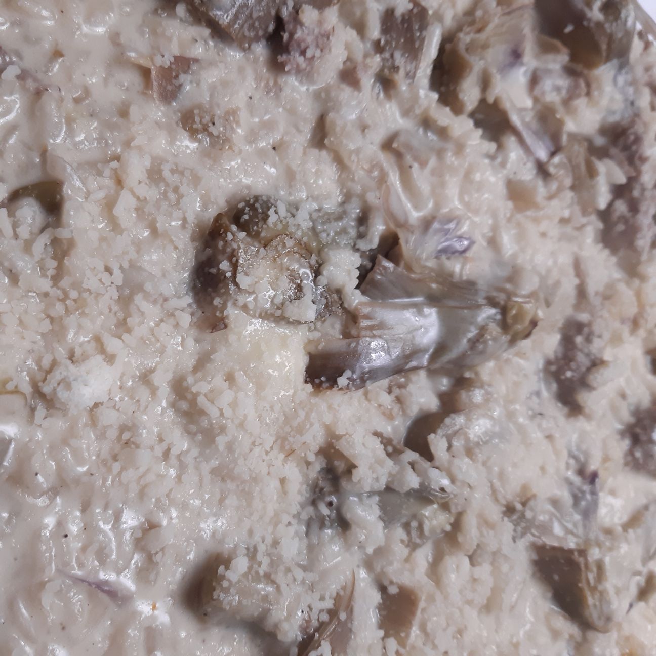 Risotto con carciofi salsiccia e taleggio..