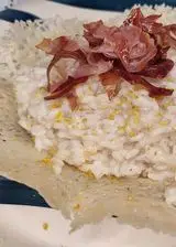 Ricetta Risotto prosciutto crudo e limone in cestino di grana