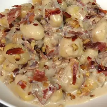 Ricetta Gnocchi con crema di gorgonzola, speck e noci di altacucina