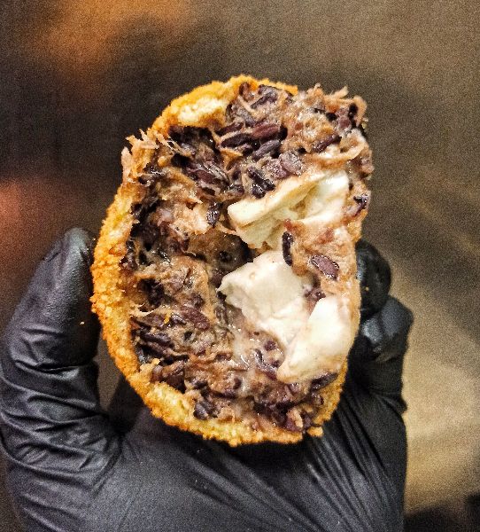 Arancini dark (porcini, pulled pork, scamorza) Al.ta Cucina