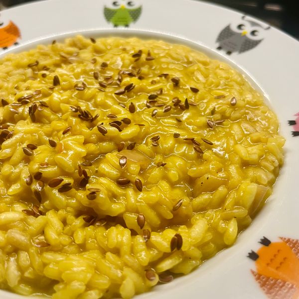 Risotto allo zafferano, semi di lino, cipolla Al.ta Cucina